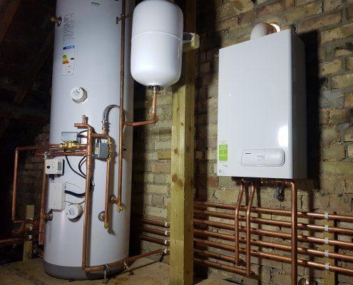 New boiler and unvented cylinder installation works in loft space in Cambridge.